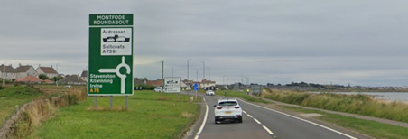 Figure 2: Photograph showing a green direction sign on approach to Ardrossan ferry port, as described in the text above